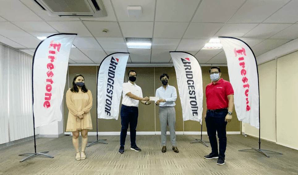 (L – R): Micaela Agoncillo, Corporate Communications Manager of HOPE Foundation; Oliver Sicam, Marketing & Strategy Director of HOPE Foundation; Marc Tagle, President & CEO of Bridgestone Philippines; and Danny Cervas, VP for Operations of Bridgestone Philippines.