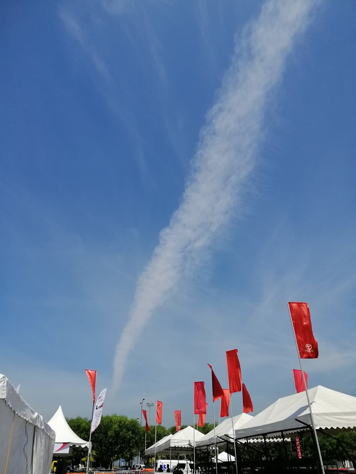 Jet stream added some texture to the Sunday skies above the venue.