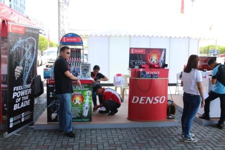 … while Denso opted for a more open display area to plug their their spark plugs.