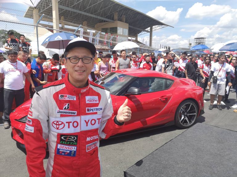 Suzuki-san poses gamely with the all-new Toyota Supra…