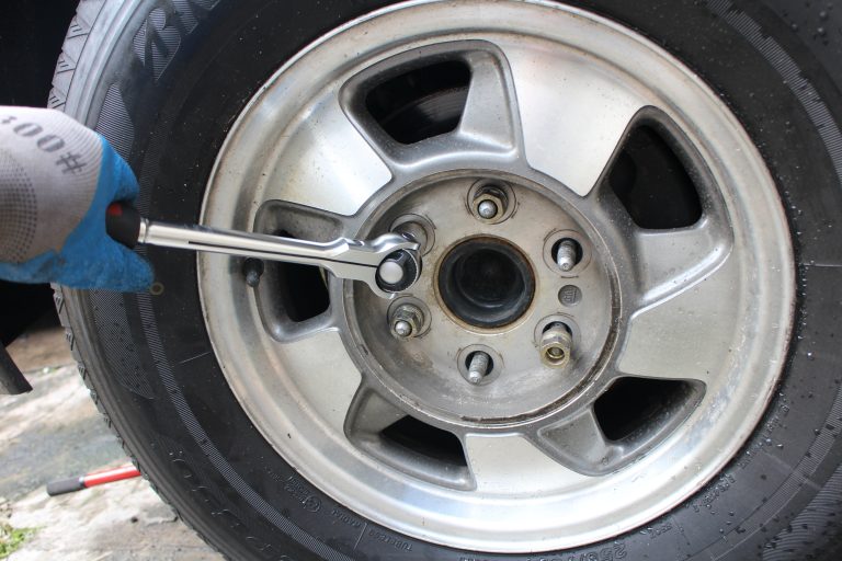 Remove the center cap of the wheel and loosen the six (6) 22mm wheel nuts.