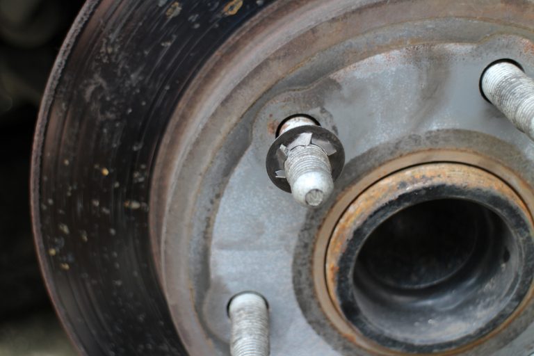 Remove two locking washers to pull the disc brake rotor from the hub assembly.