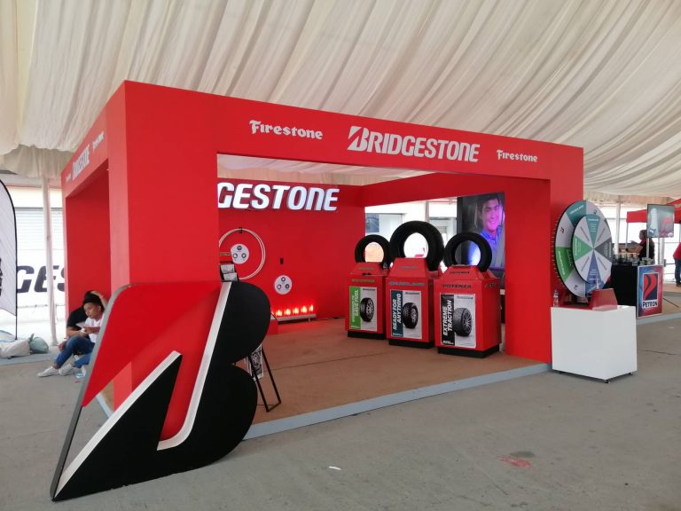 Bridgestone’s tires display booth is the more organized display.