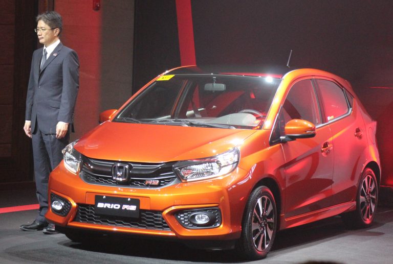 Takakura-san proudly stands beside the all-new Honda Brio RS.